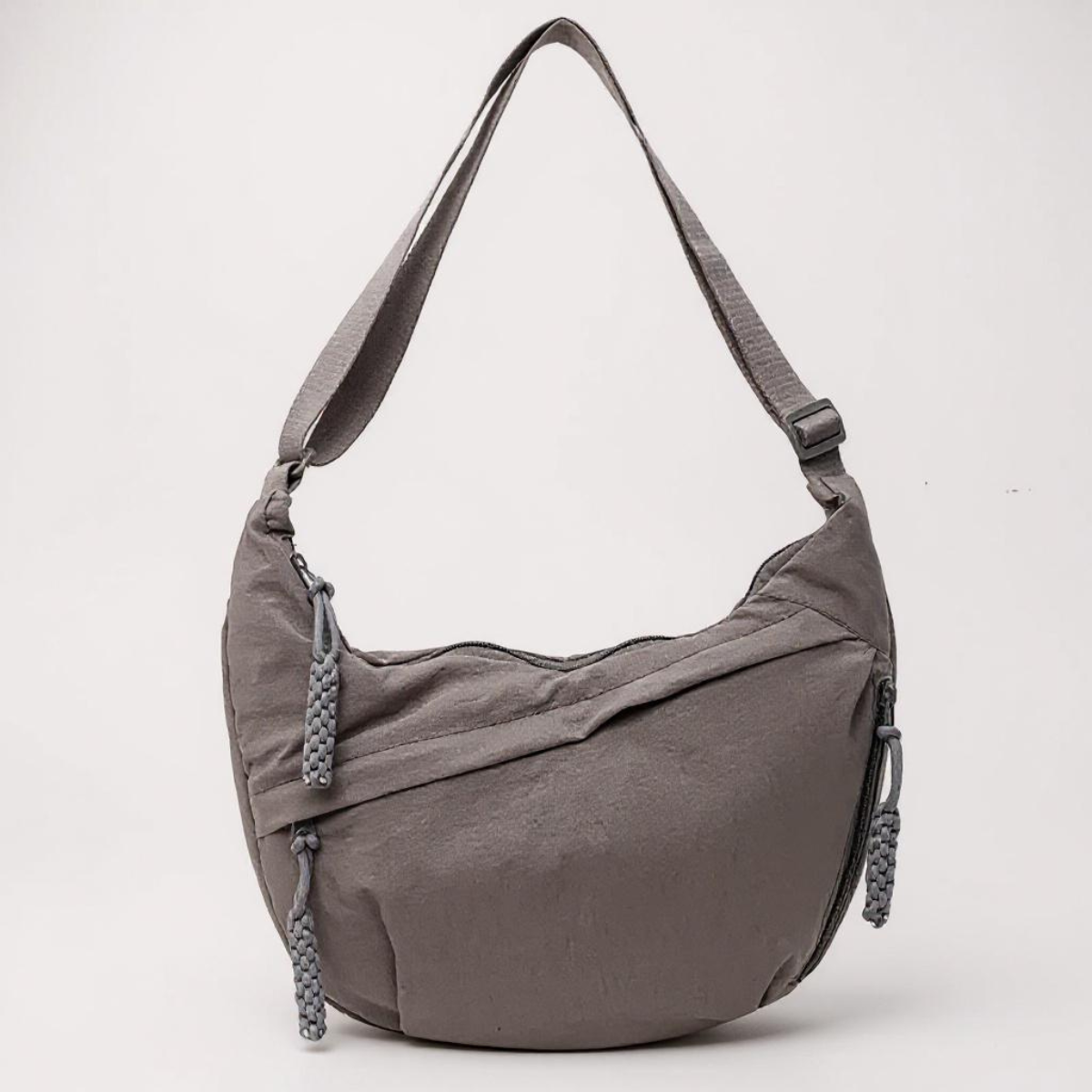 Beatrice crescent shoulder bag in grey, front view with adjustable strap
