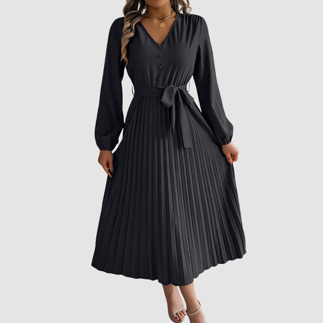 Celeste Bloom pleated midi dress in black, full-length front view