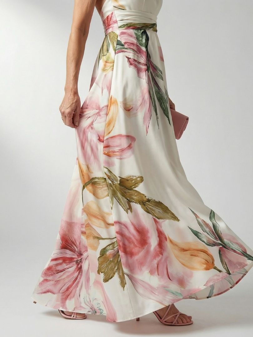 Amiel maxi dress close-up of painted lily print skirt and sash waist