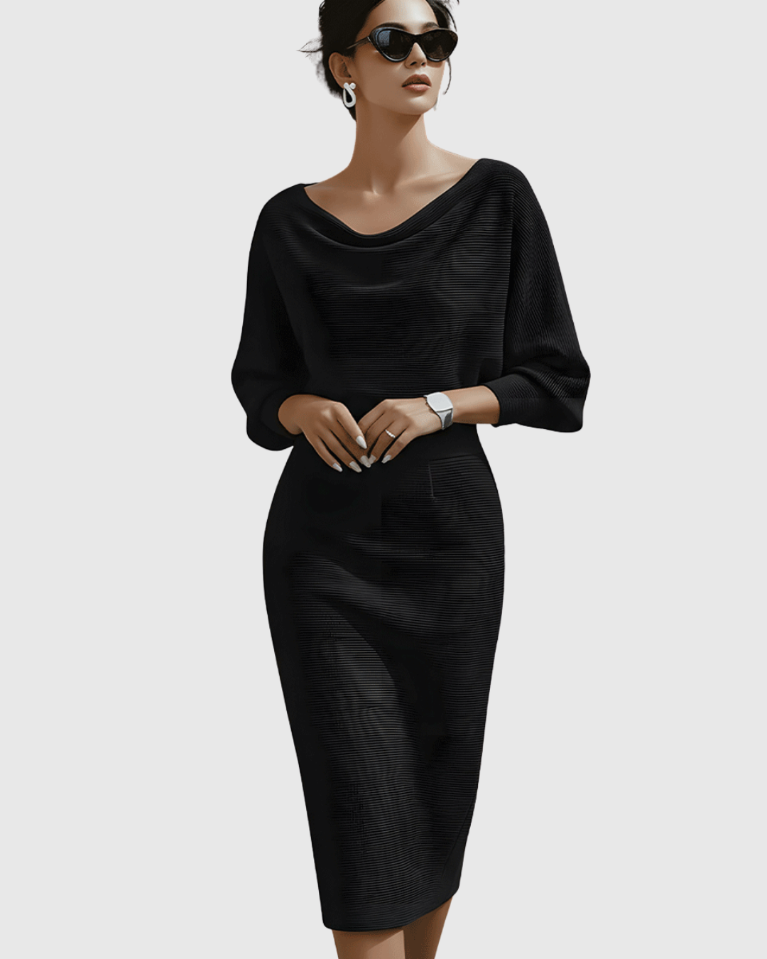Isméria draped batwing midi dress in black, front view