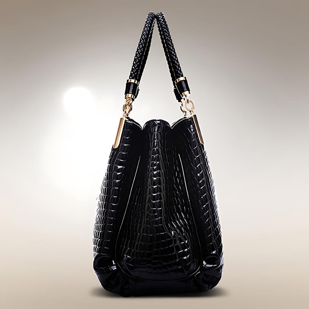 Lusso Milano crocodile shoulder bag in black, side view with braided handles