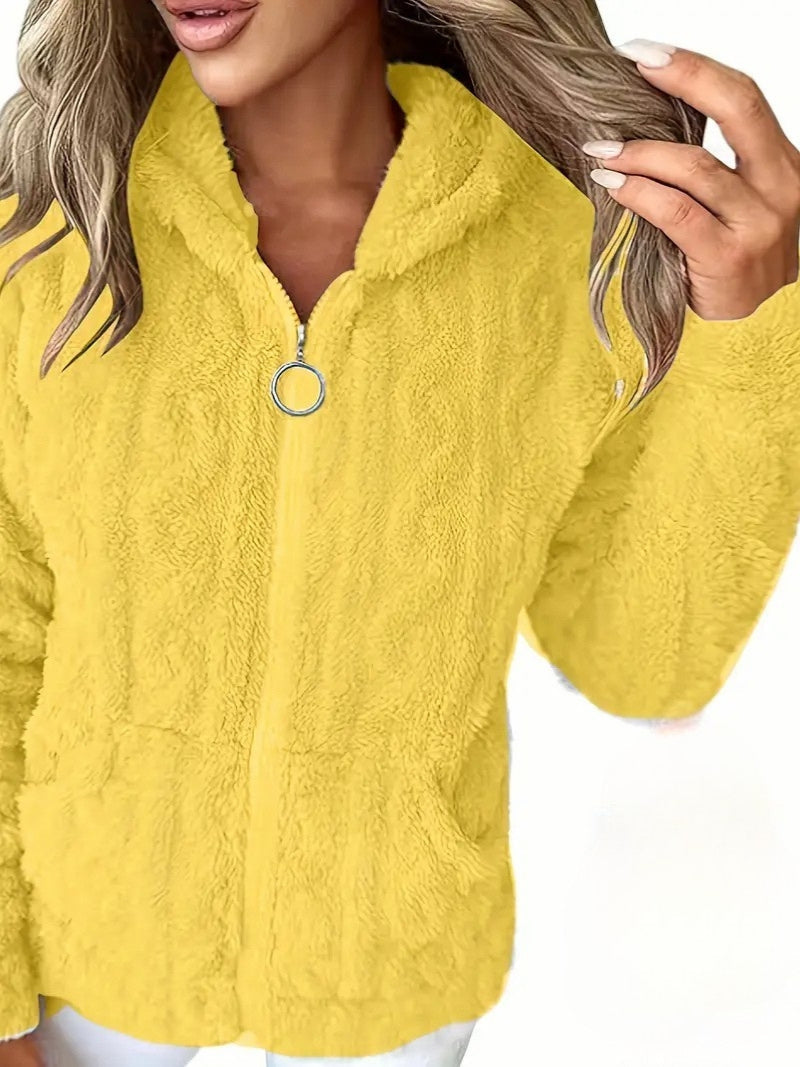 Ruth zip-up hoodie in yellow, close-up of fleece texture and pockets