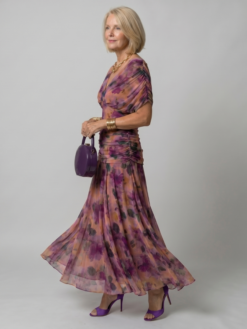 Calen off shoulder midi dress in purple floral, side view showing flared skirt