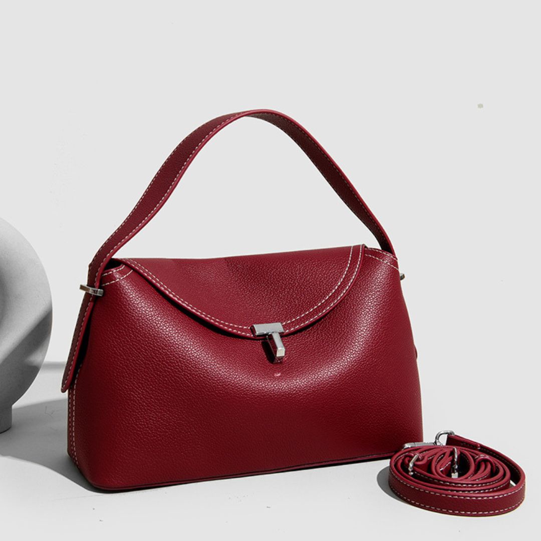 La Divine handbag in ruby red with long adjustable strap