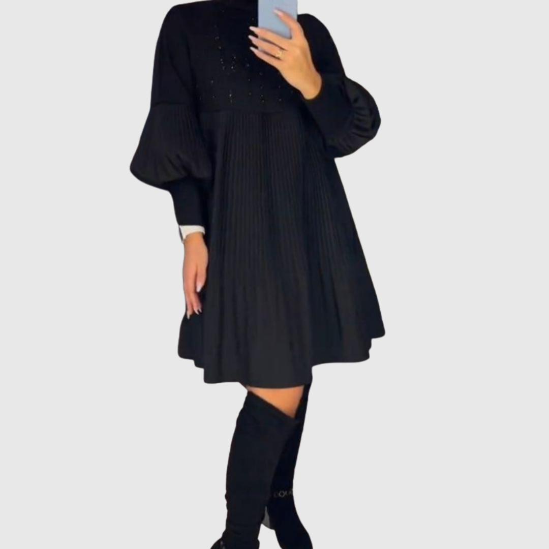 Elodie pleated puff-sleeve gown in black, full front view with tall boots