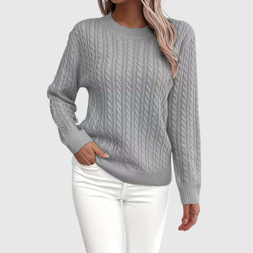 Isla cable-knit sweater in grey, front view on model