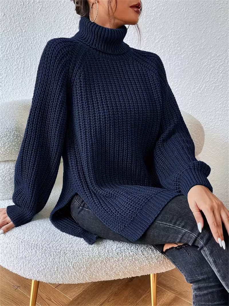 Rylani oversized turtleneck sweater in navy blue, seated front view