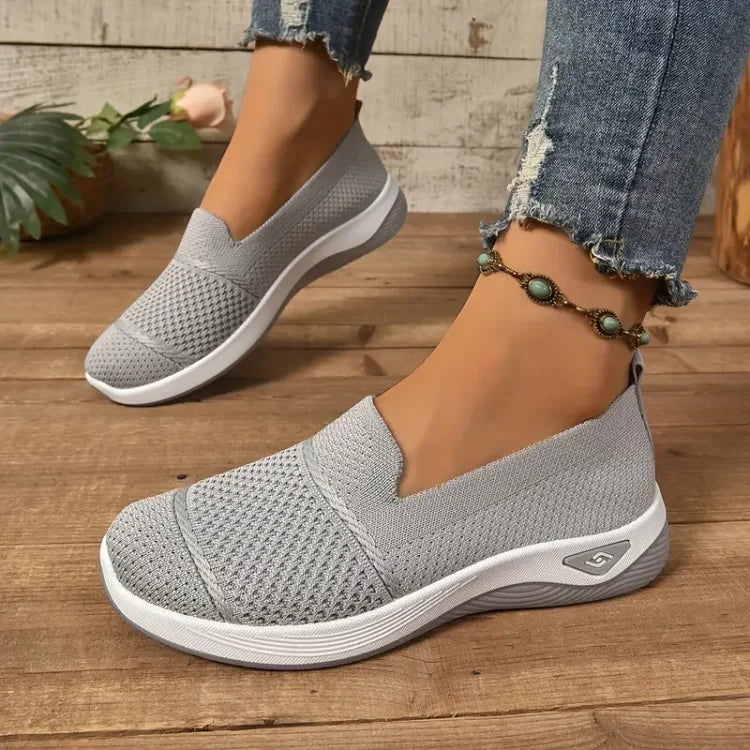 Azalea slip-on sneakers in grey, worn front view