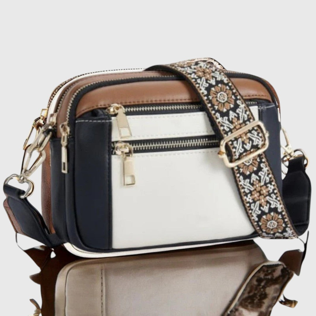Dina shoulder bag in navy, white and brown, front view