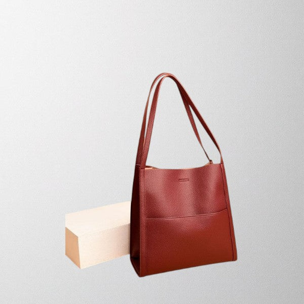 Valérie Dupré shoulder bag in red, three-quarter side view