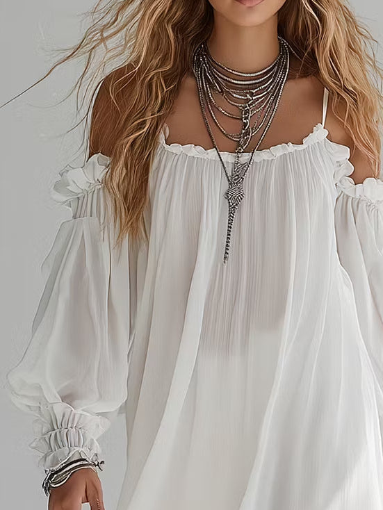 Mélusine mini dress in white, close-up of ruffled off-shoulder neckline