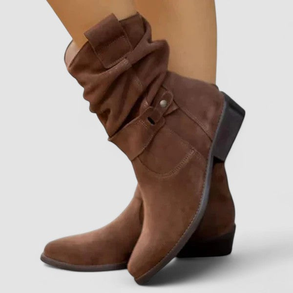 Elyse slouch-style western boots in dark brown, worn side view