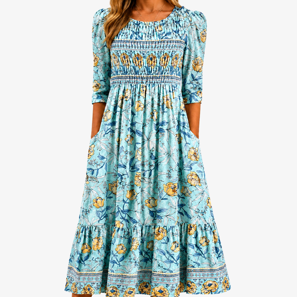 Golden Bloom smocked garden midi dress in aqua blue floral, front view