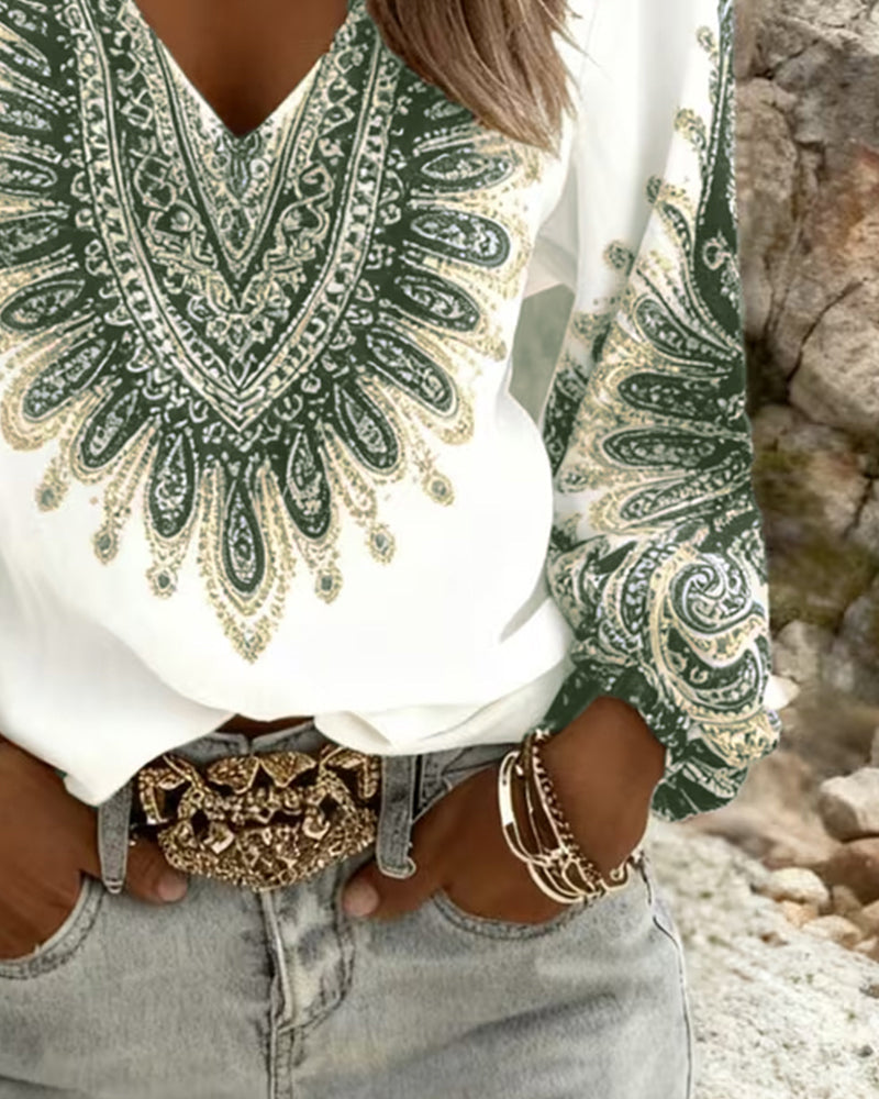 Elara paisley print blouse in green, detail of sleeve print