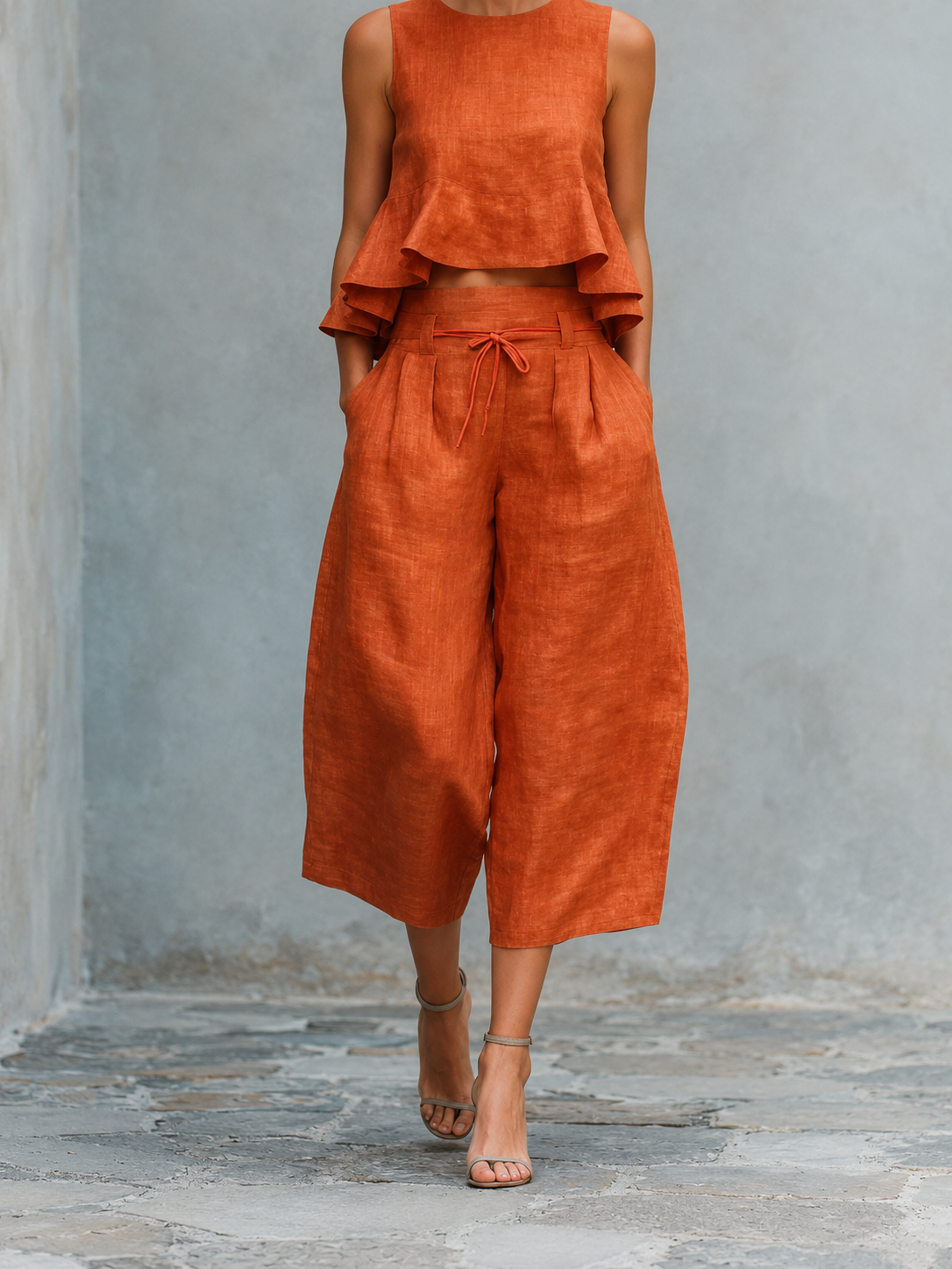 Freya two-piece ruffled set in orange, full-length front view