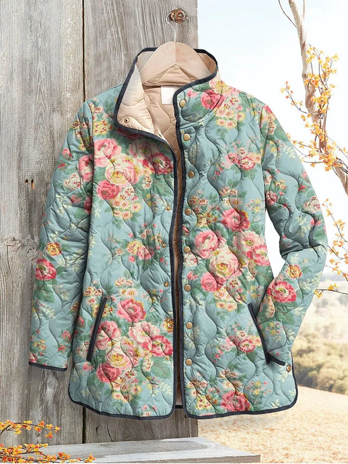 Dorothea quilted jacket in sage green floral print, front view