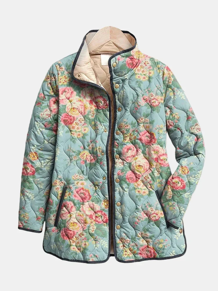 Elara quilted floral print jacket in sage green, front view with stand collar