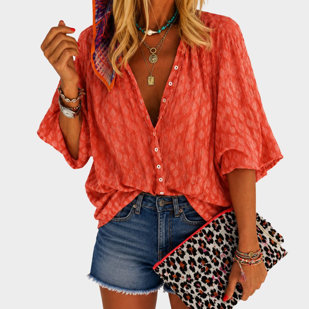 Coral print button blouse in coral, front view worn loose with shorts