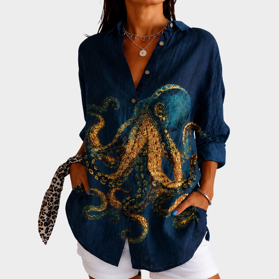 Deep blue ocean motif blouse in navy with golden octopus print, front view