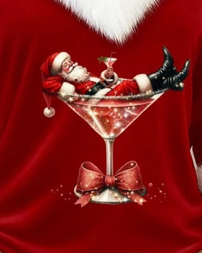 Close-up of Santa cocktail print on red Kavira sweater