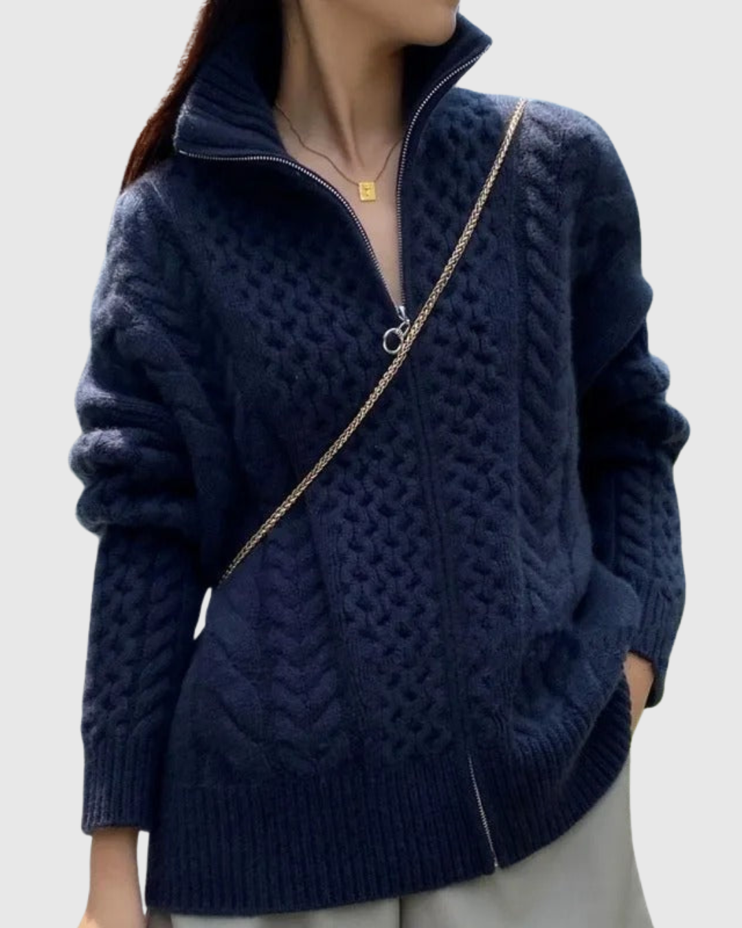 Evarine cable-knit cardigan in navy, zipped high collar front view