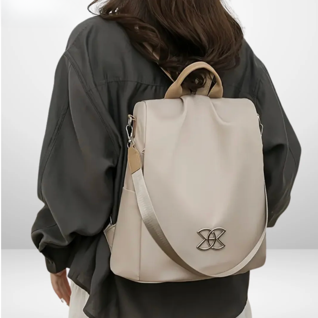 Rosalba anti-theft backpack in beige, worn on the back