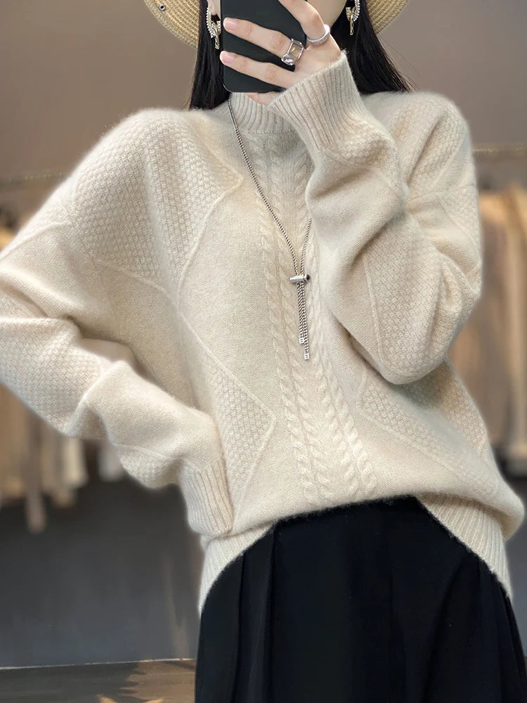 Vaesira cable-knit cashmere sweater in white, three-quarter view with black skirt
