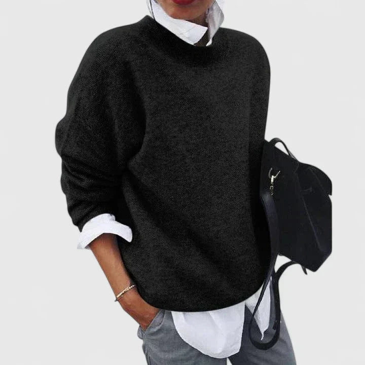 Isabellynn relaxed knit sweater in black, front view with layered shirt