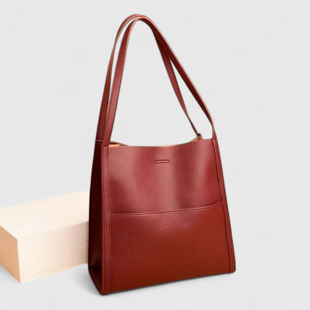 Elegant shoulder tote in red, three-quarter front view