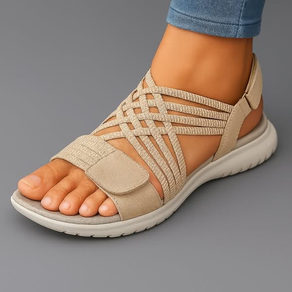 Sanarita sandals in beige, worn side view with back strap