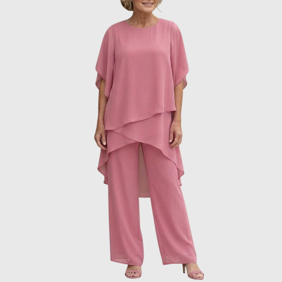 Elara palazzo set in soft pink worn with heeled sandals