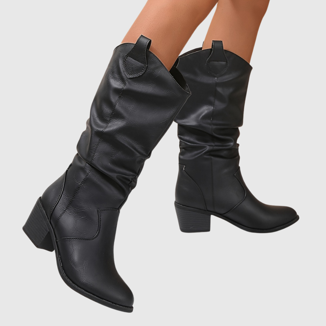 Hattie Western boots in black, angled view on model