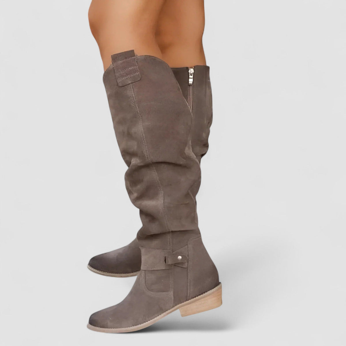 Adeliza slouch knee-high riding boots in brown, close-up of side zip and ankle strap