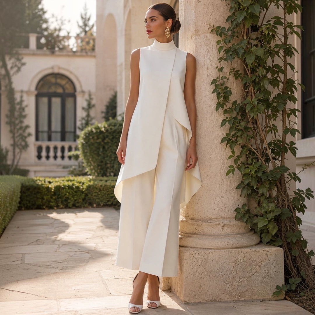 Valentina draped jumpsuit in white, full-length garden view