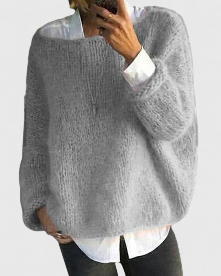 Jozelyn sweater in grey, layered over a white shirt, front view
