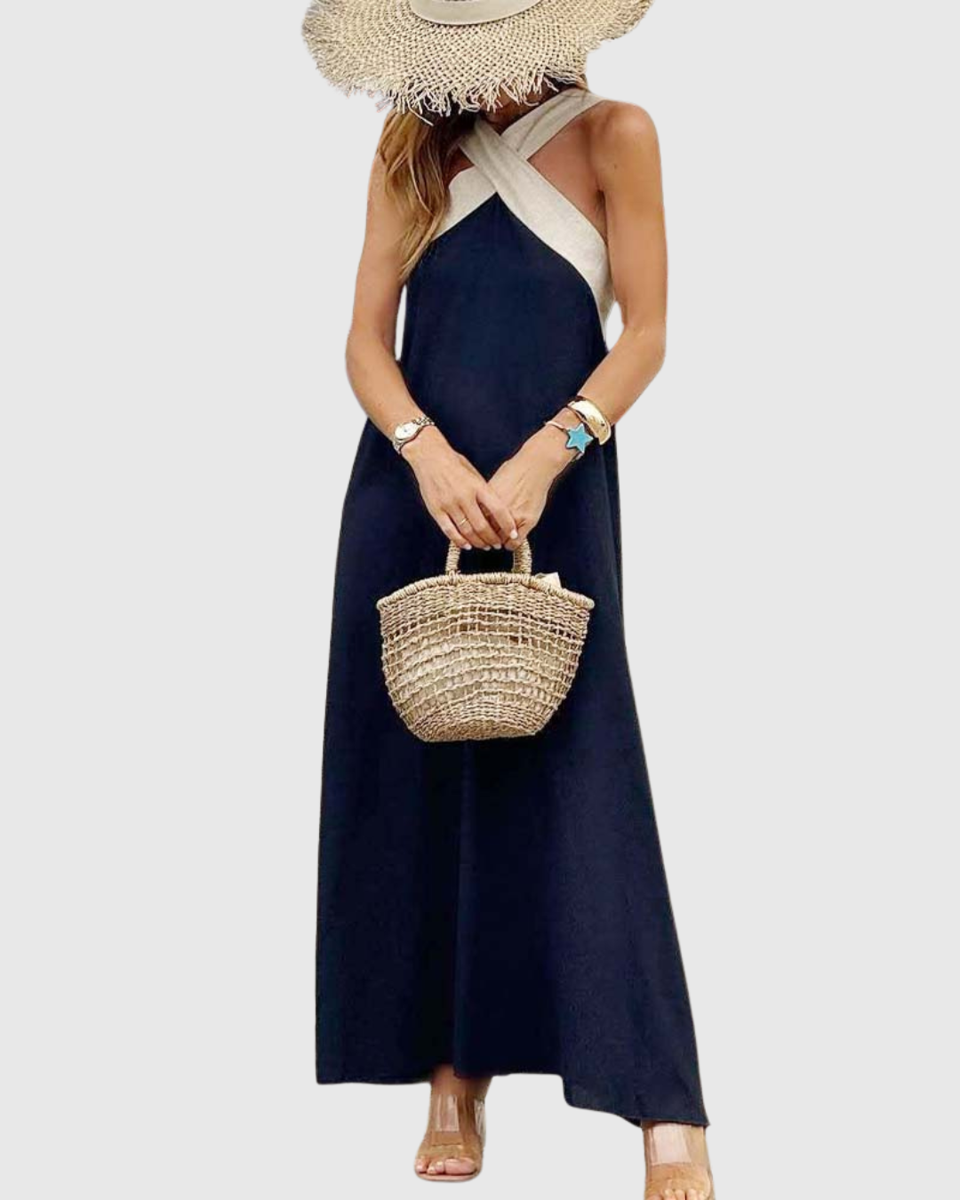 Orella cross-neck maxi dress in black, front view with basket bag