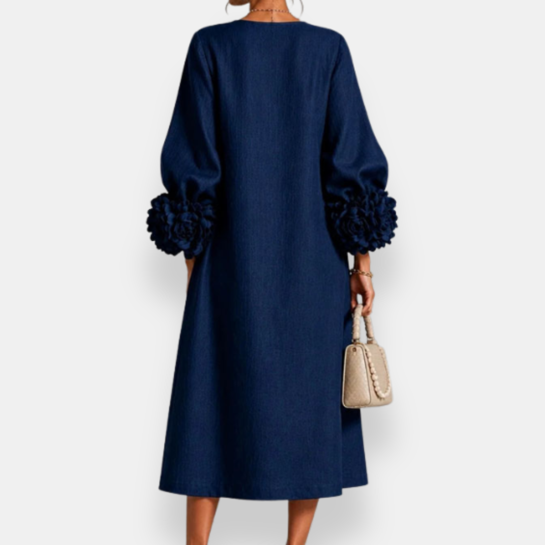 Annabelle floral appliqué midi dress in navy blue, back view with rose cuffs