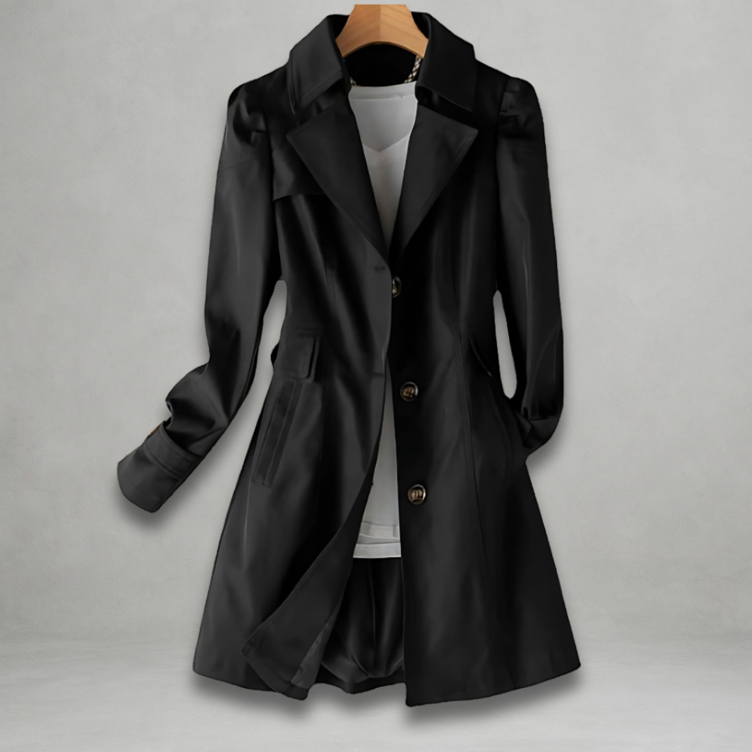 Clarisse trench coat in black, front view with button fastening