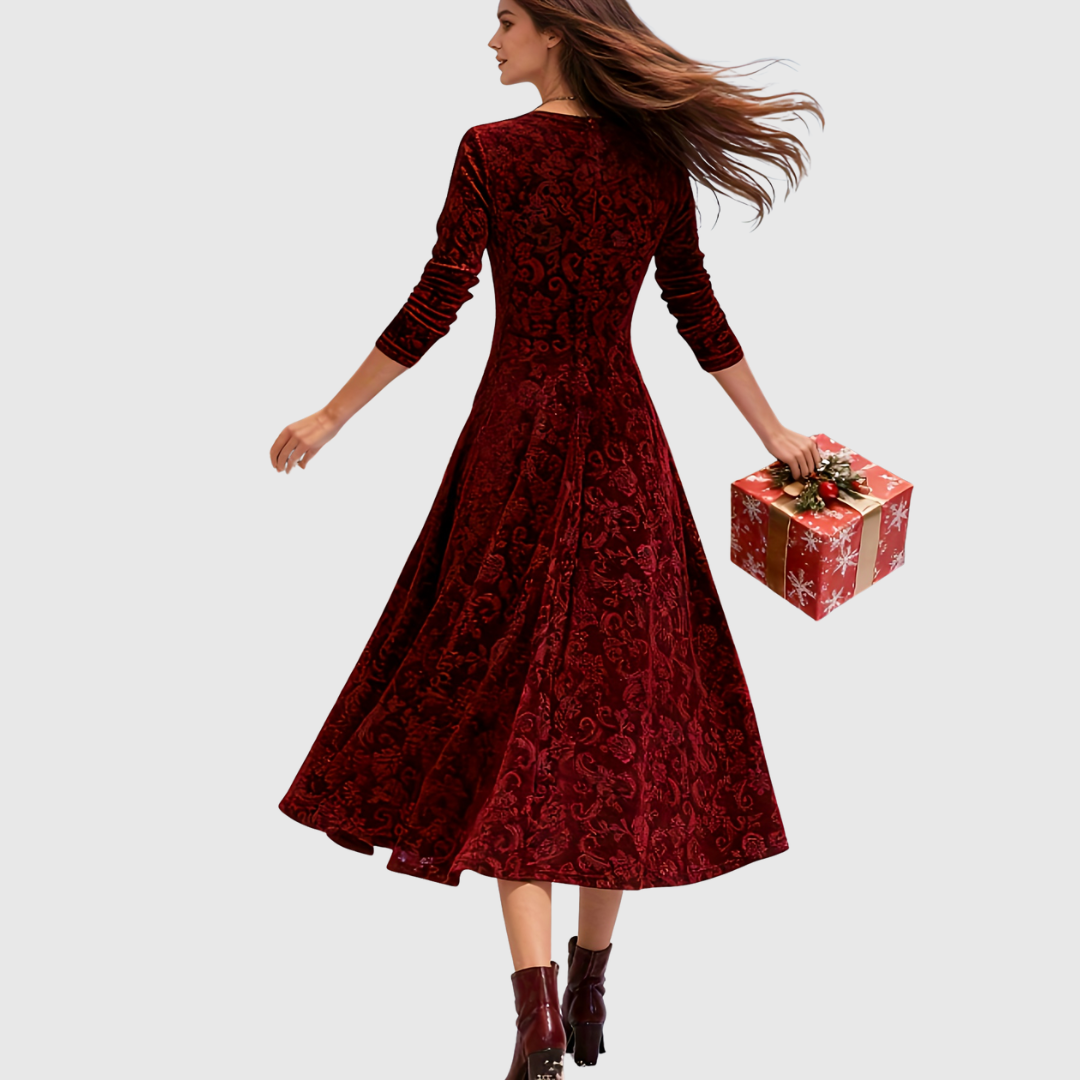 Grece velvet dress in red, back view showing flared skirt