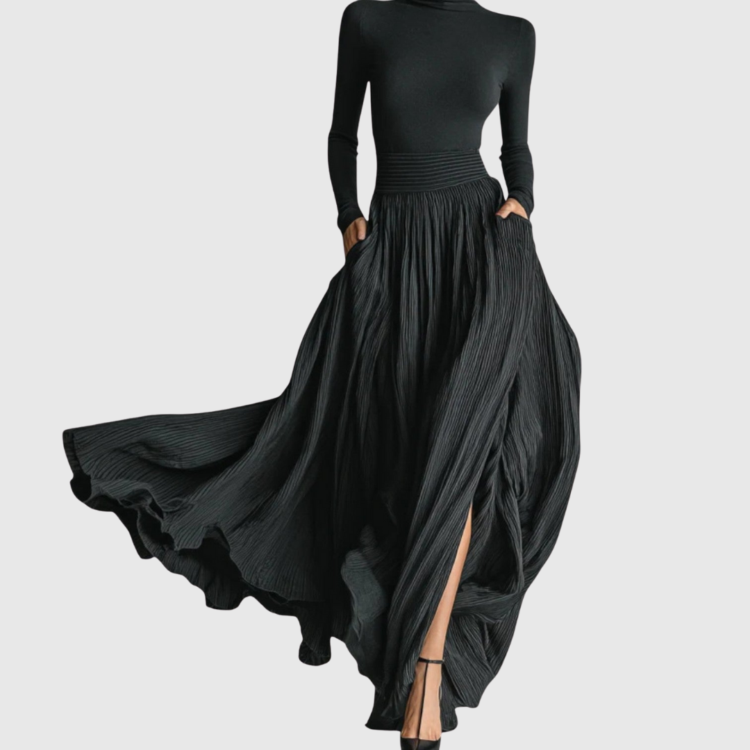 Cerynn high-waist maxi skirt set in black, full-length view with skirt in motion