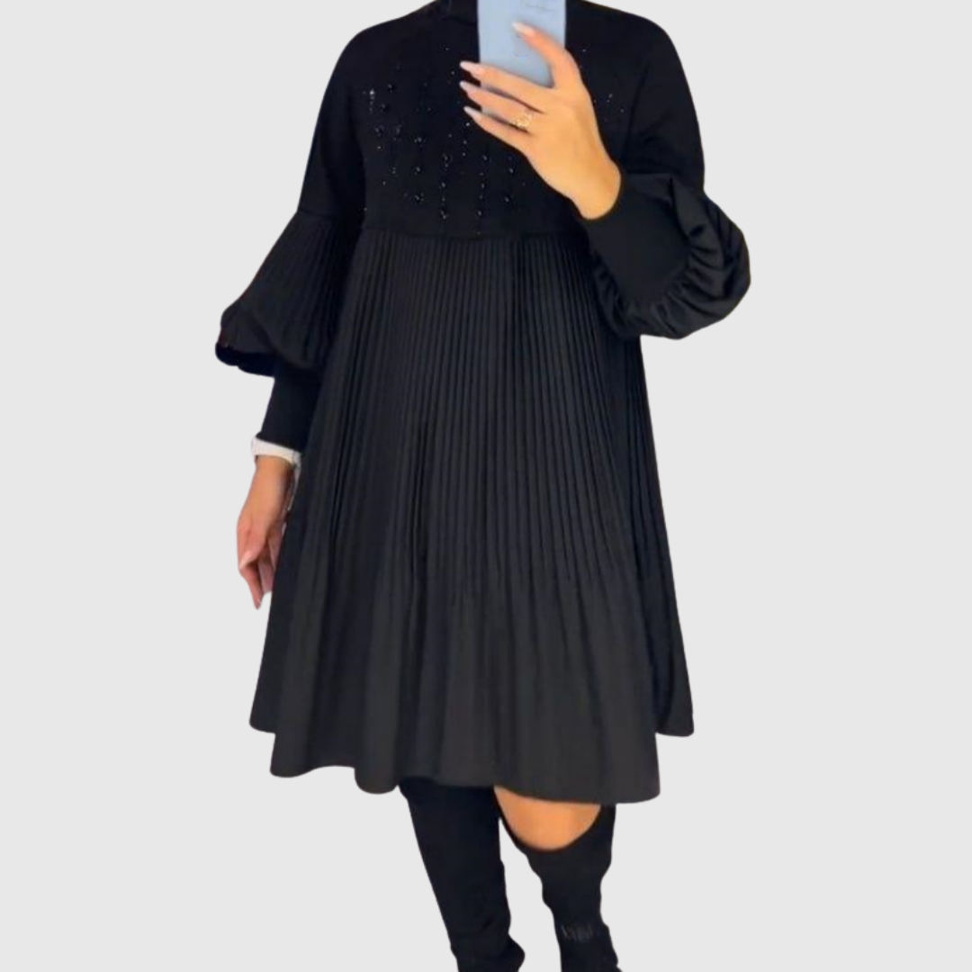 Elodie pleated puff-sleeve gown in black, pleated skirt shown in movement