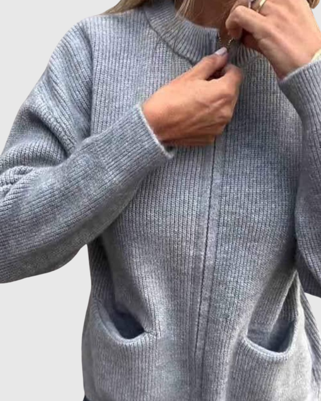 Alvera knit cardigan in grey, close-up of front zip and pockets