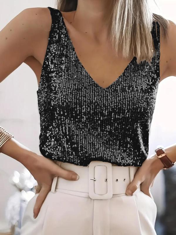 Lucie sparkling sequin V neck top in black, front view worn with white trousers