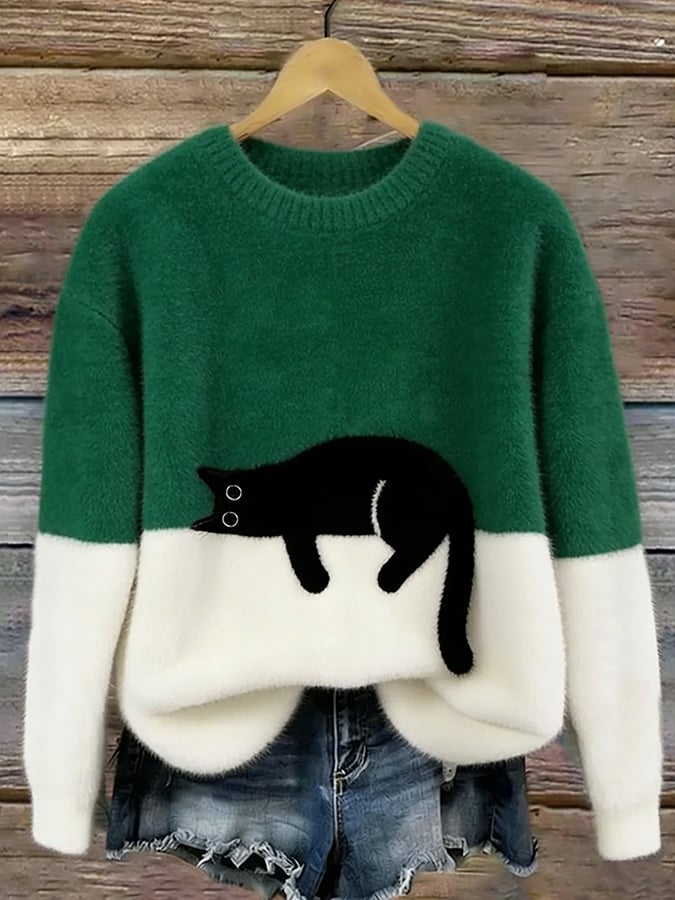 Aileen cat print oversized sweater in green and cream, front view