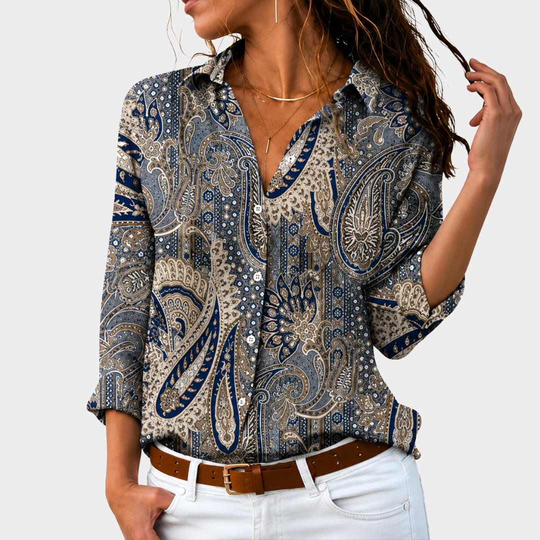 Timeless paisley blouse in navy and sand, front view worn with white jeans