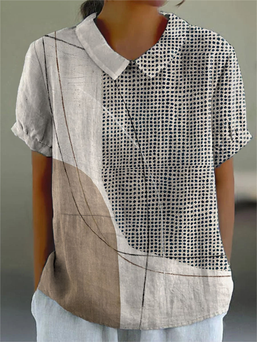 Lana blouse in neutral beige and cream with navy abstract dots, front view