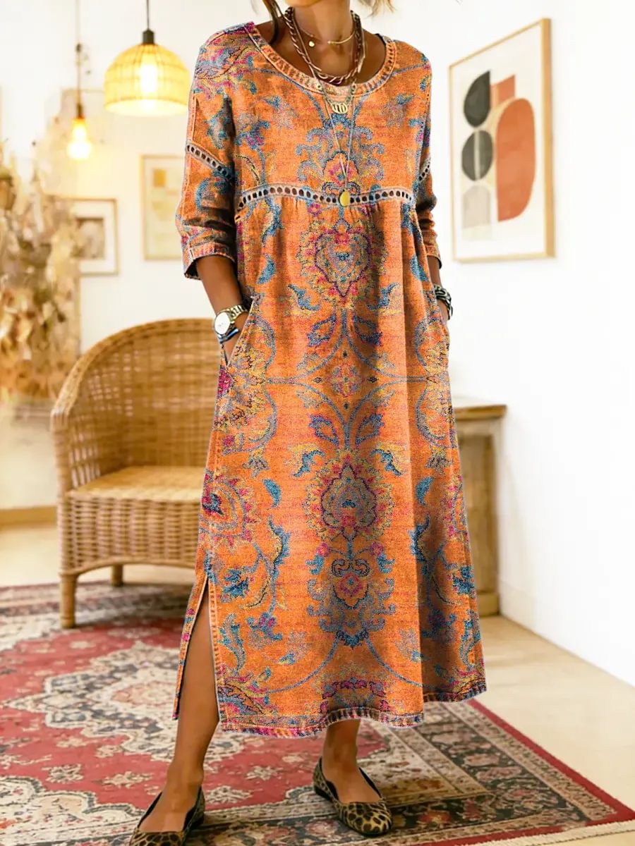 Eugenia printed maxi dress in orange floral, full-length front view with side slit