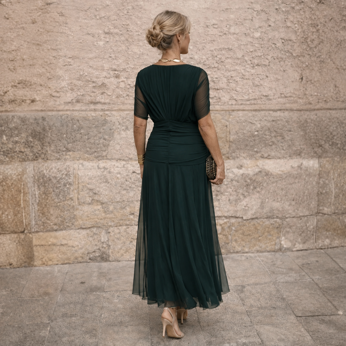Eliza maxi dress in deep green, back view with ruched waist