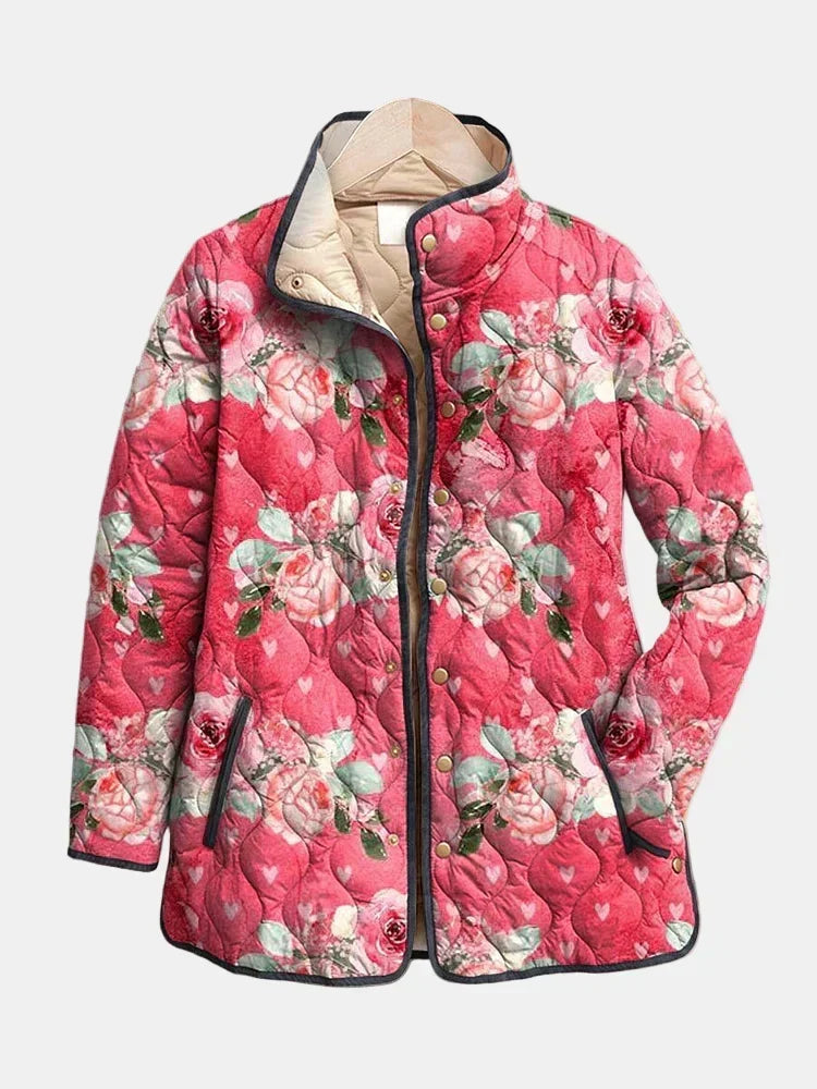 Freya quilted jacket in pink floral print, front view with stand-up collar