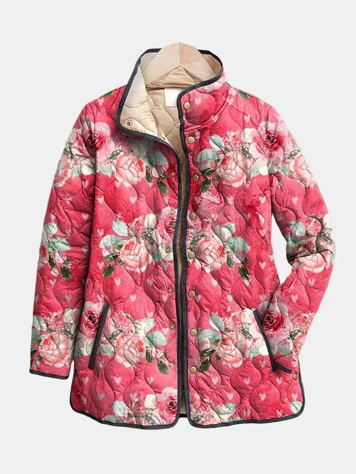 Freya quilted jacket in pink floral print, front view with stand-up collar